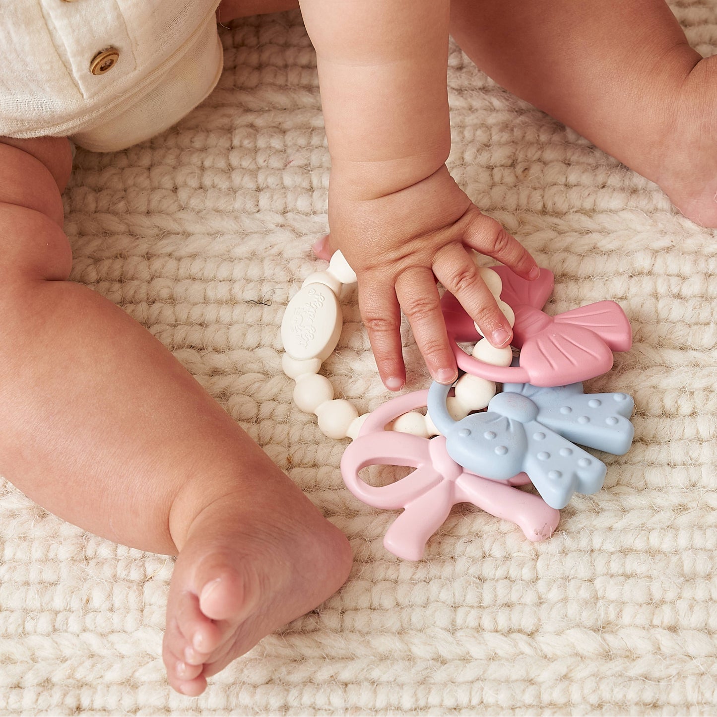 Itzy Trio™ Bows Teether