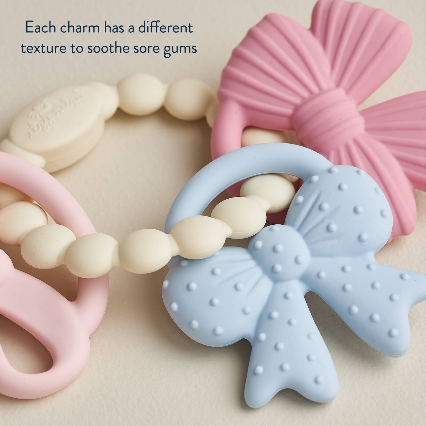 Itzy Trio™ Bows Teether